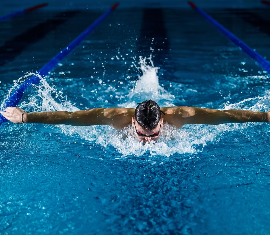Athletes training in a competitive swimming pool